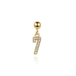 Close-up of number 7 pendant in gold S925 silver with sparkling crystals and a smooth finish