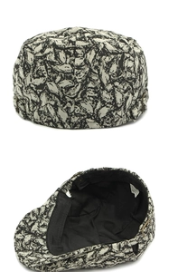 Detailed macro view showing the ethnic jacquard fabric texture and side metal buckle