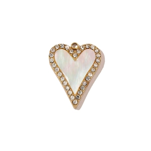 Macro shot of 14k gold plated heart pendant with white seashell inlay and sparkling rhinestones