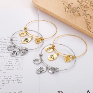 Minimalist adjustable heart and flower bangle with personalized silhouette pendants