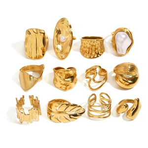 12-piece set of gold-toned titanium steel rings featuring pearl accents and leaf designs