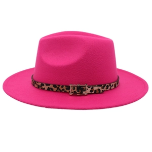 Fuchsia fedora jazz hat featuring a leopard print belt and golden buckle in a front view
