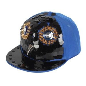 Blue hip-hop snapback hat with black sequin owl design and metallic gold studs