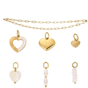 Gold chain necklace with assorted heart, shell, and bead pendants on white background