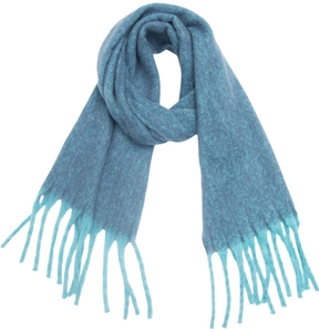 Detail of blue gradient boucle knit scarf featuring thick fringe and textured yarn weave