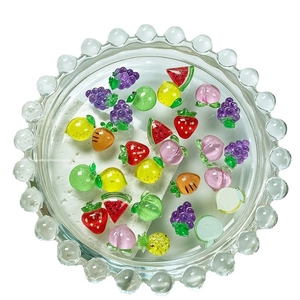 Colorful resin summer fruit nail art charms including watermelon and strawberry shapes
