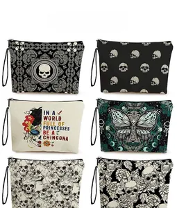 Détails de six trousses de toilette aux motifs de papillons et têtes de mort avec fermeture