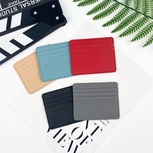 Multi-slot leather card holders in various colors like red, blue, beige, black and grey