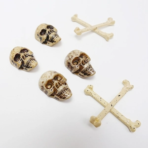 Miniature Halloween skull and crossbones skeleton set for DIY festive decorations
