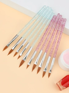 Détail de 10 pinceaux nail art en acrylique pailleté avec poils synthétiques et viroles