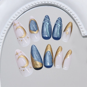 Blue cat eye press on nails with gold celestial moon and star 3D embossed designs