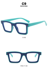 Detail view of square TR90 eyeglass frames featuring dual-tone blue finish and metal rivets