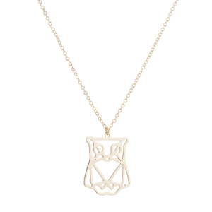 Macro view of a gold geometric owl pendant necklace made of stainless steel links