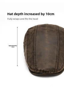 Détails d'une casquette en cuir marron vintage avec mesure de profondeur de 10 cm