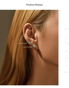 Detail showing 5mm and 6mm Paraiba color silver stud earrings with classic 4-prong setting