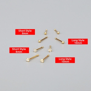 Dettaglio degli orecchini in argento S999 placcati oro in 8mm e 10mm con zircone