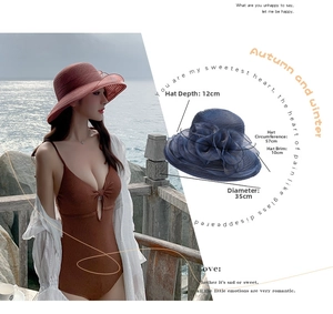 Detailed view of women organza flower beach hat with size dimensions 10cm wide brim