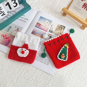 Handmade crochet Christmas apple bags with Santa Claus and tree patterns for holiday gifts