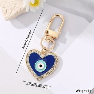 Detailed view showing dimensions of Evil Eye heart keychain with sparkling rhinestones