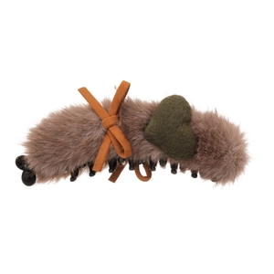 Plush brown banana clip with butterfly knot and green heart detail for winter hair styling