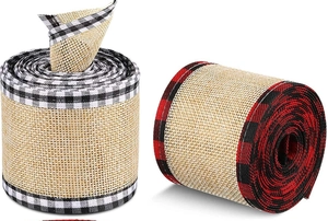 Close-up of burlap ribbons with black white and red black plaid edges for Christmas decor