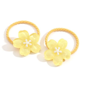 Pair of yellow flower elastic hair ties with glitter finish for girls and kids