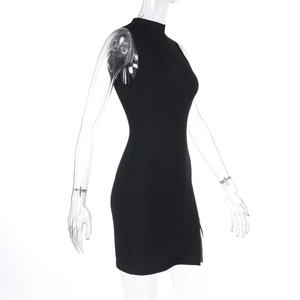Close-up of the black sleeveless high-neck mini dress showing side slit and fabric texture