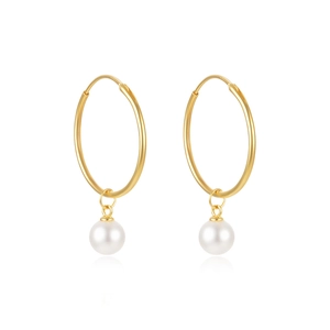 Detailed view of large gold hoop earrings with white pearl pendants on white background