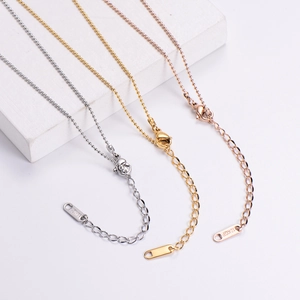 Detailed view of 18KGP bead chain necklaces in silver, gold, and rose gold with lobster clasps