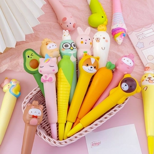 Colorful cartoon squishy pens set with cute animal shapes in a white storage basket