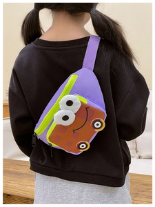Rear view of child wearing purple cartoon bus crossbody bag with waffle pattern details