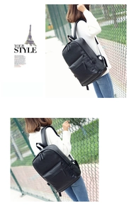 Detail of adjustable shoulder straps on a black PU leather minimalist backpack for men