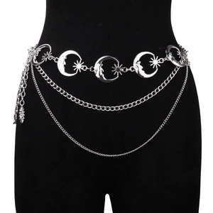 Detail of silver multi-layer chain belt featuring crescent moon and star decorative elements