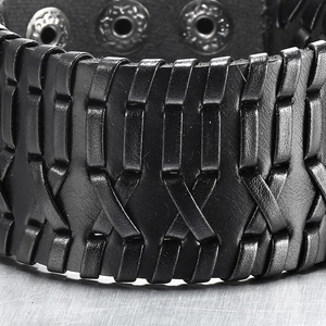 Men's punk braided black leather bracelet with metal clasp on a metallic background