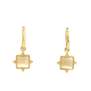 Detailed view of vintage gold hoop earrings with square cat eye stone inlay and bead trim