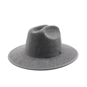 Detailed top view of a dark grey wool fedora hat featuring a classic grosgrain ribbon trim