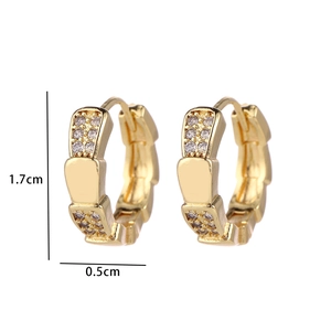 Detailed view of geometric gold hoop earrings with white zircon scales measuring 1.7cm