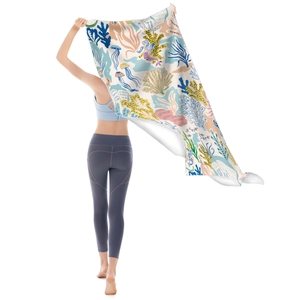 Microfiber oversized beach towel with blue seagrass, pink shells, and coral print
