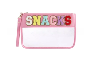 Detail of pink leather and transparent PVC pouch with SNACKS chenille patches