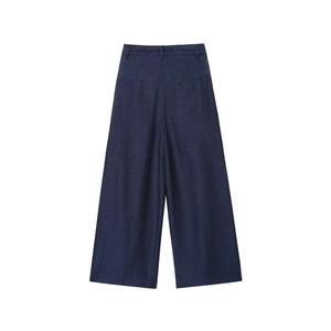 Detailed view of high-waisted navy blue wide-leg trousers in linen-blend fabric