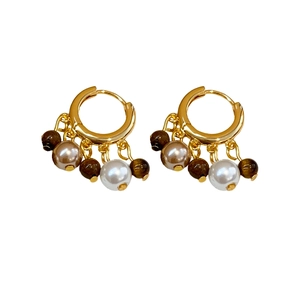 Vintage gold hoop earrings featuring pearl and tiger eye stone beads in a fringe style