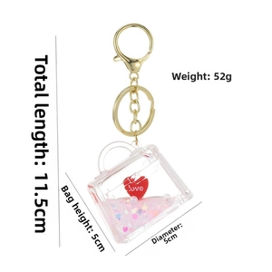 Detailed view of heart liquid quicksand keychain with precise size dimensions shown