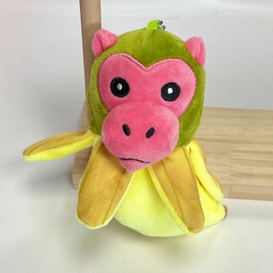 Creative plush monkey banana transformation keychain with soft fur and metal clip