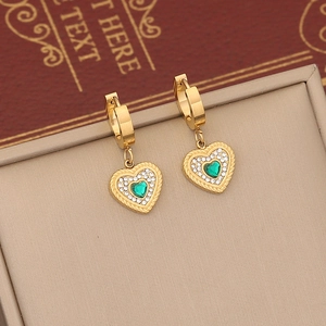 Golden heart-shaped emerald drop earrings featuring a twisted frame with zircon accents
