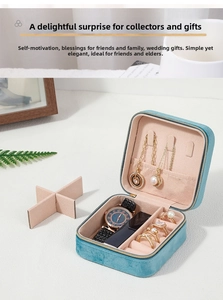 Detail view of velvet jewelry box with zipper closure and modular interior dividers