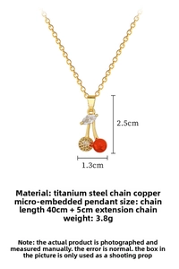 Detailed view of titanium steel cherry pendant necklace with cubic zirconia micro-pave crystals