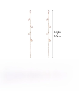 Detail specifications for long zircon tassel earrings in rose gold showing size and weight