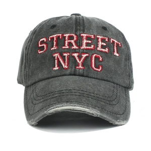 Distressed washed cotton baseball cap featuring NYC embroidery and a wide curved brim