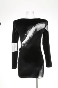 Detailed view of the black velvet dress with mesh splicing and sheer cutout textures