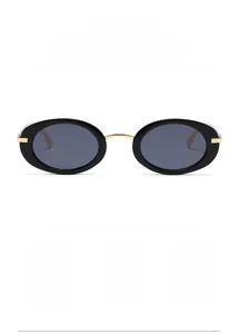 Detail of retro Y2K oval sunglasses featuring a black frame and gold metal bridge